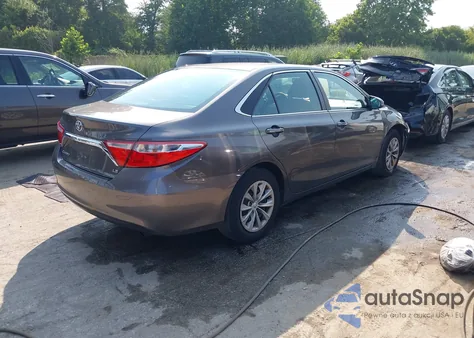 2016 Toyota Camry Le z USA, uszkodzony, nr VIN 4T4BF1FK8GR570922